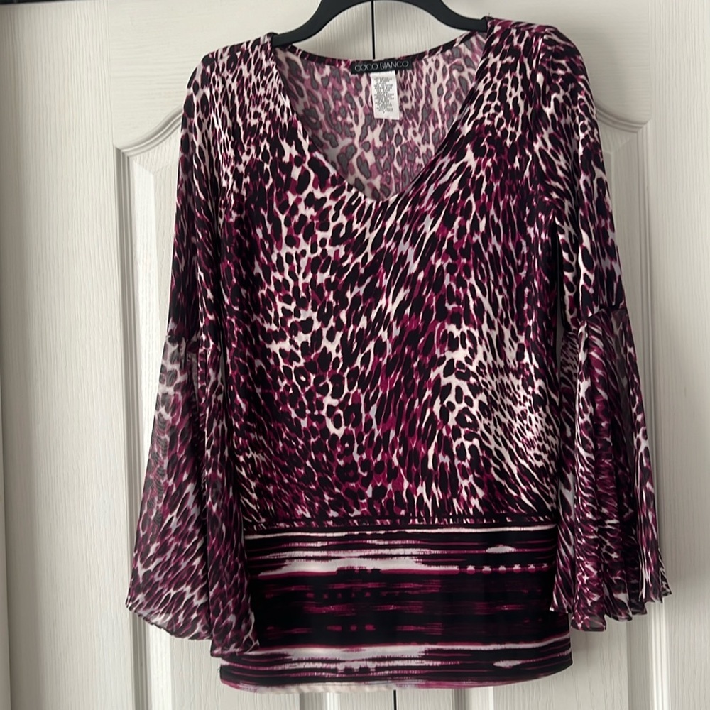 Flared long sleeve Tunic.